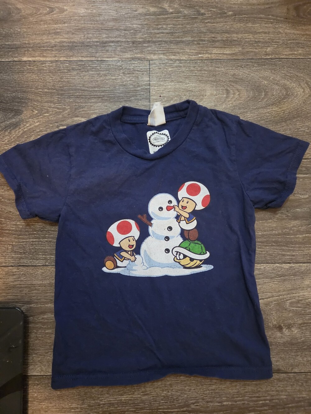 Nintendo Navy Blue Kids Tee with Toads Building Snowman Graphic